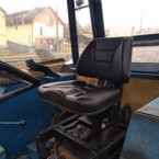 univerzalnu odpruženu sedacku (sedadlo) na traktor
