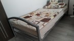 Kovová posteľ s matracom