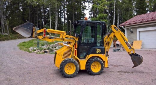 JCB 1CX rýpadlo-nakladač šmykom riadený nakladač