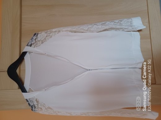 Damska top.novy..velkost:L..8 euro
