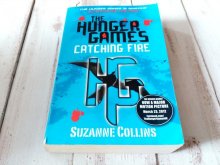 Suzanne Collins - The Hunger Games; Catching Fire